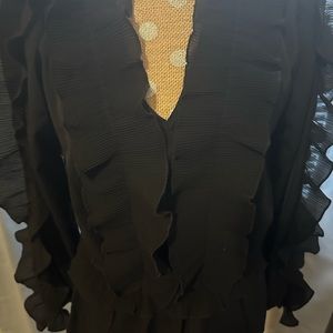 Black ruffled blouse